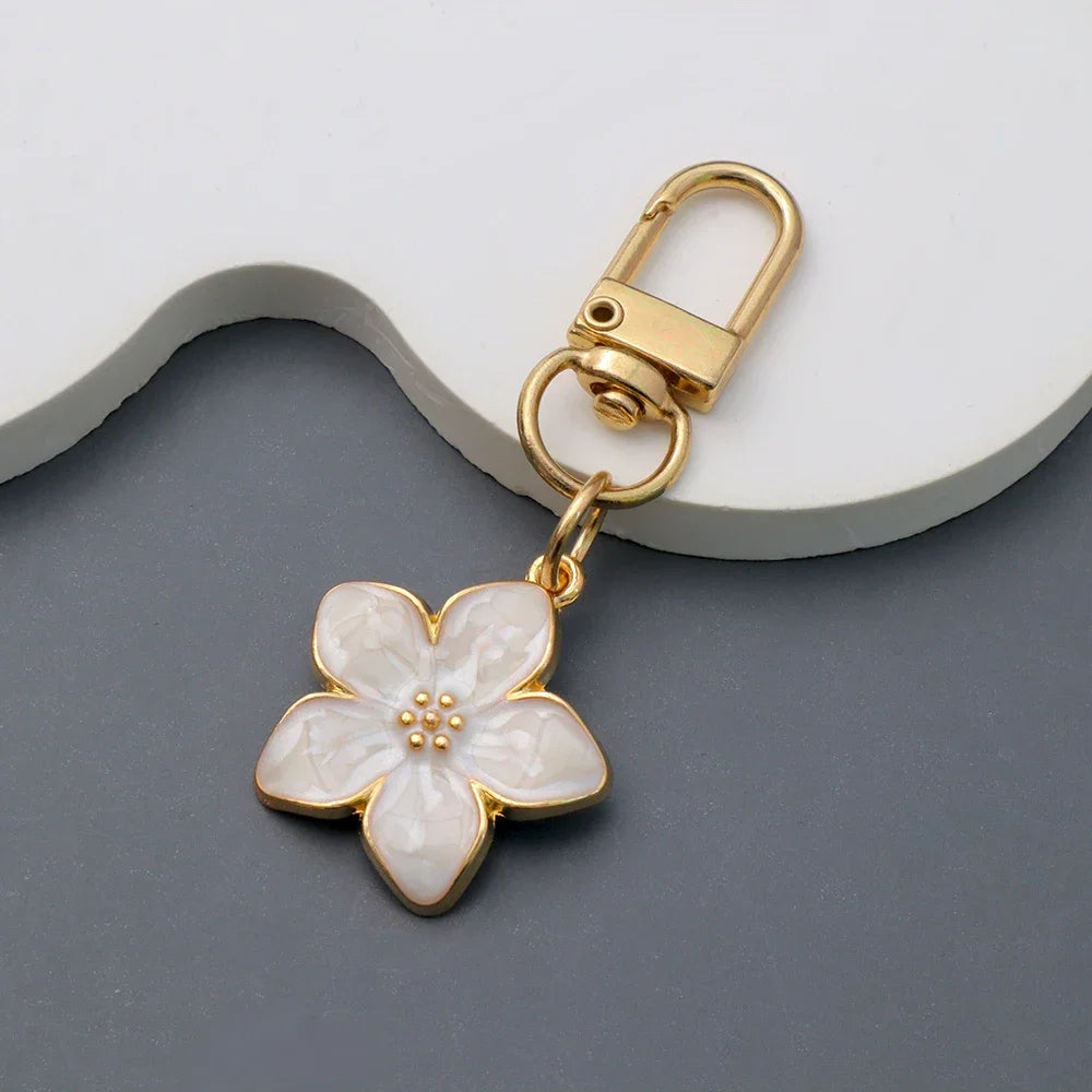 Lovely Enamel Sakura Keychain Mini Flower Keyring Handbag Pendants Car Key chain Jewelry Accessories Earphone Case DIY Ornament