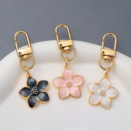Lovely Enamel Sakura Keychain Mini Flower Keyring Handbag Pendants Car Key chain Jewelry Accessories Earphone Case DIY Ornament